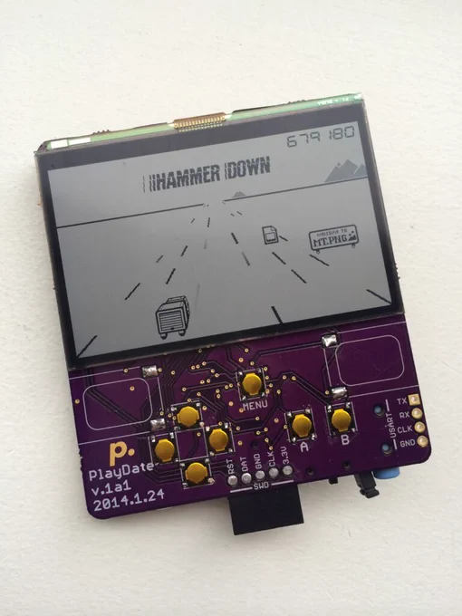 An early Playdate prototype, with screen and circuit board.