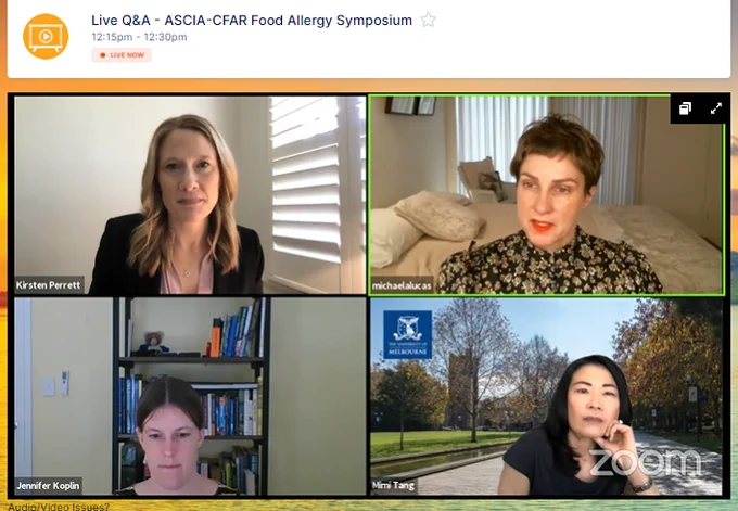 Image of 4 women having a conversation. 