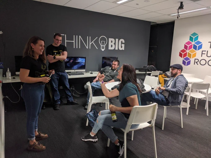 Game jammers and sponsors brainstorming games together.