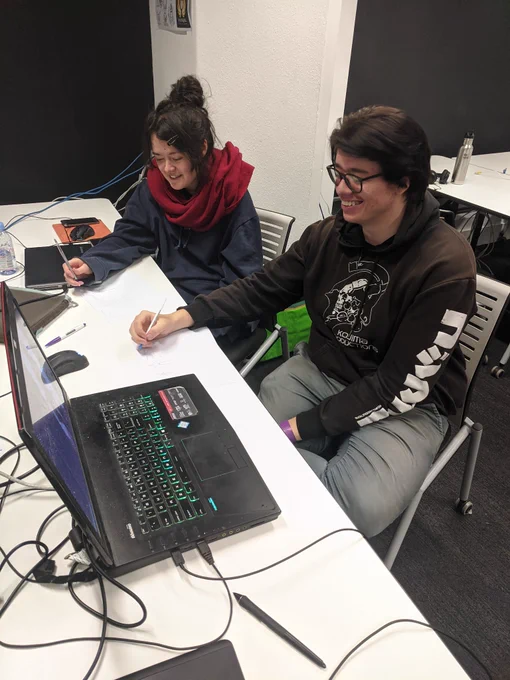 Two game gamers planning their game together.