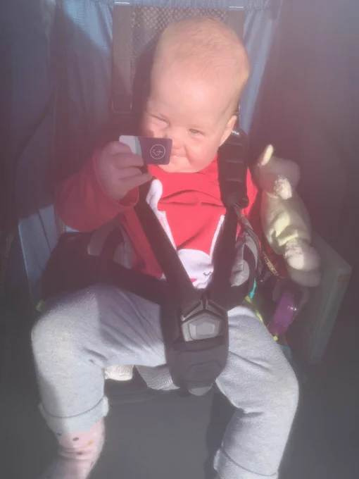 Baby S with a parkrun token