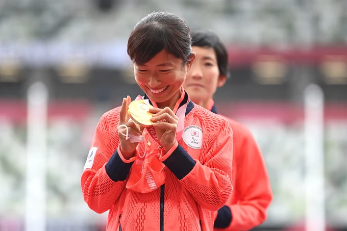 Gold medalist Misato Michishita of Team Japan poses during the women’s Marathon.