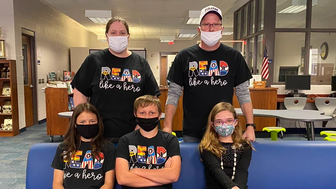 Three students and two coaches from Northeastern Randolph Middle School after the Battle of the Books Competition.