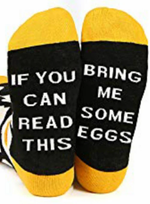 Black and yellow socks, on the sole it states ' if you can read this, bring me eggs '