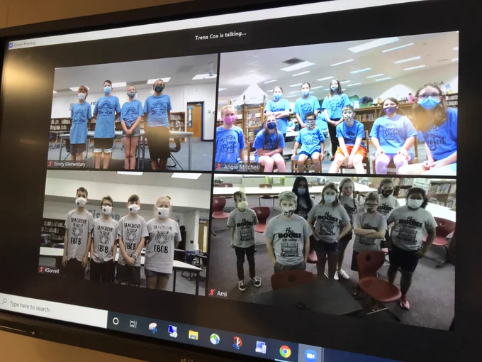A photo of a Zoom meeting with four elementary battle of the book teams on it. 