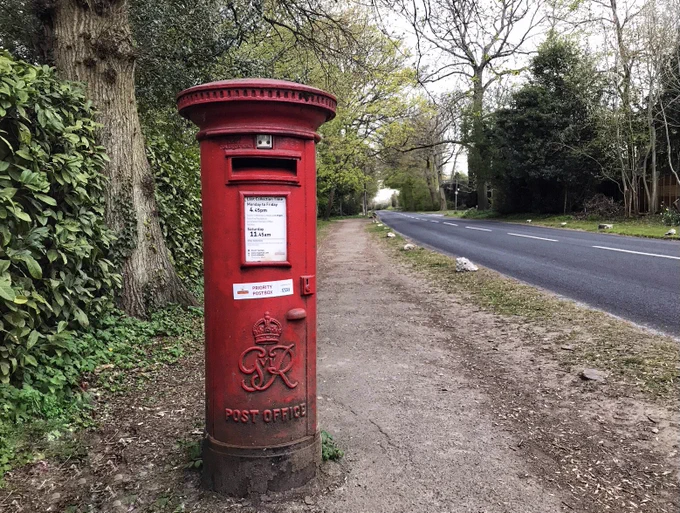 Postbox on empty road