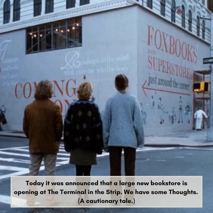 A still from YOU GOT MAIL where Kathleen and her employees stare up at the Fox Books Superstore in the process of being built out. 