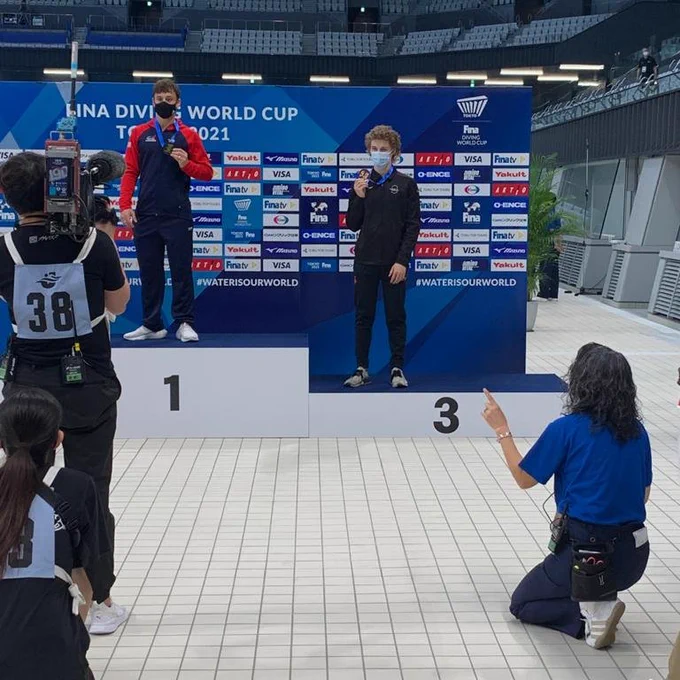 Rylan (right) on the podium with his medal.