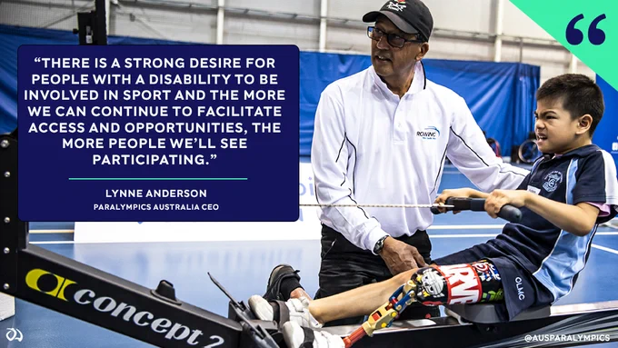 Image of a young male left leg amputee on a rowing machine with an adult male supervising. Text on the left of the image reads: There is a strong desire for people with a disability to be involved in sport and the more we can continue to facilitate access and opportunities, the more people we’ll see participating. Lynne Anderson, Paralympics Australia CEO.