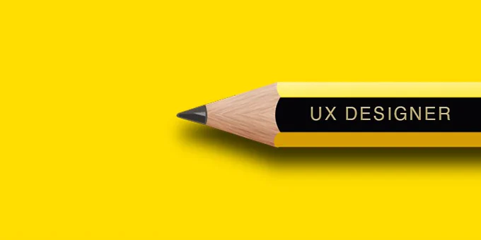 Pencil with UX designer written on. 