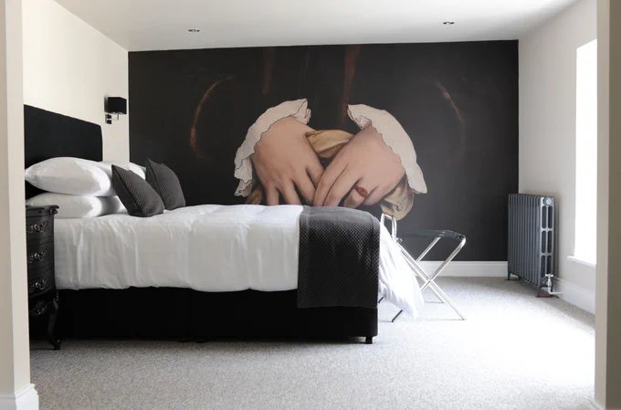 Bedroom in Swain House boutique B&B, Watchet, Somerset, with wall mural and double bed