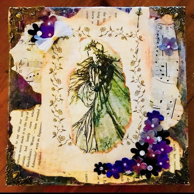A collage made using music notation, pages from a book, flowers, and painting