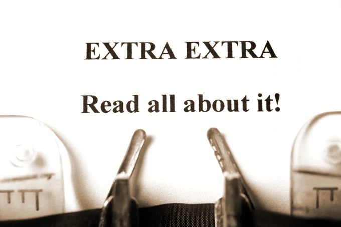 Picture of old typewriter with text "Extra extra, Read all about it!"