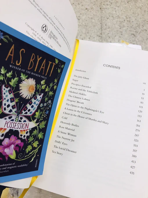 A shot of the table of contents which include Racine and the Tablecloth. Also, the yellow bookmark ribbon.
