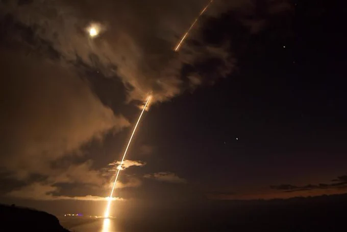 An SM-6 missile fired from the guided missile destroyer USS John Paul Jones intercepts a medium-range ballistic missile target. (Photo: Missile Defense Agency)