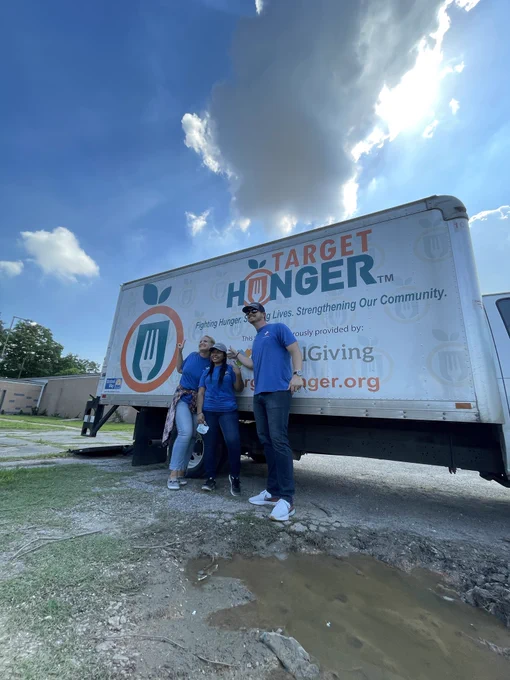 Port Houston employees post for a photo with the Target Hunger truck.