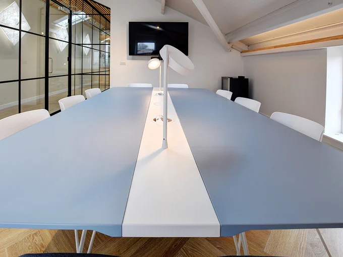 Work table with in-desk electrics and task lights 