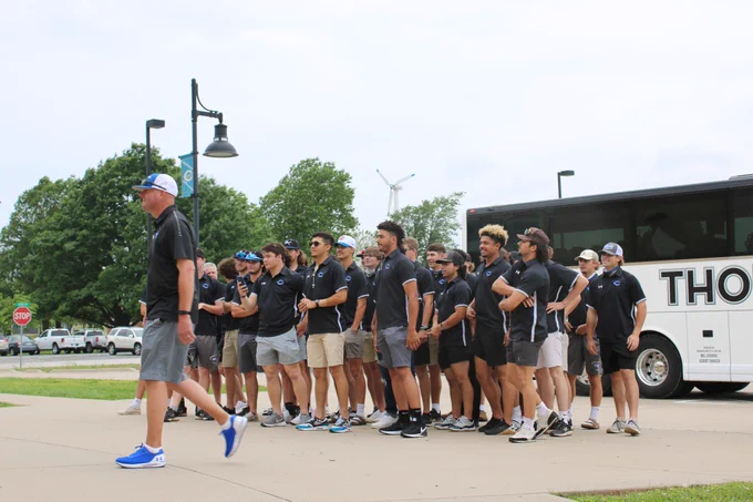 Head Coach, Travis Lallemand, leads players during send-off. #GoRoughriders