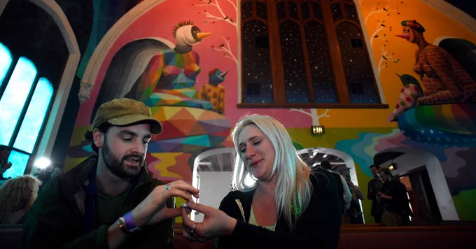 Two people attend services at the International Church of Cannabis on April 20, 2017, in Denver.
