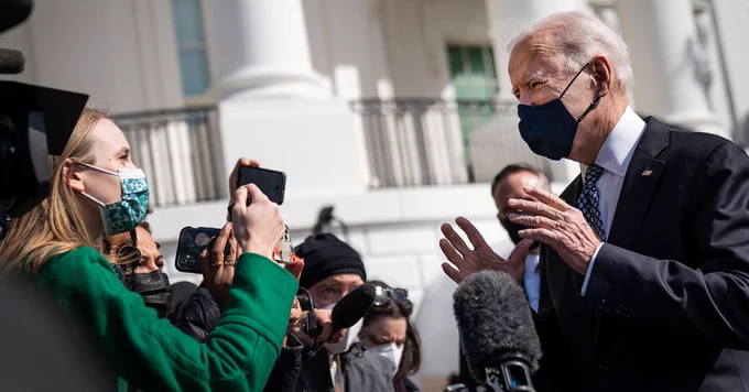 President Joe Biden talks briefly with reporters before boarding Marine One on the South Lawn of the White House on March 19, 2021.