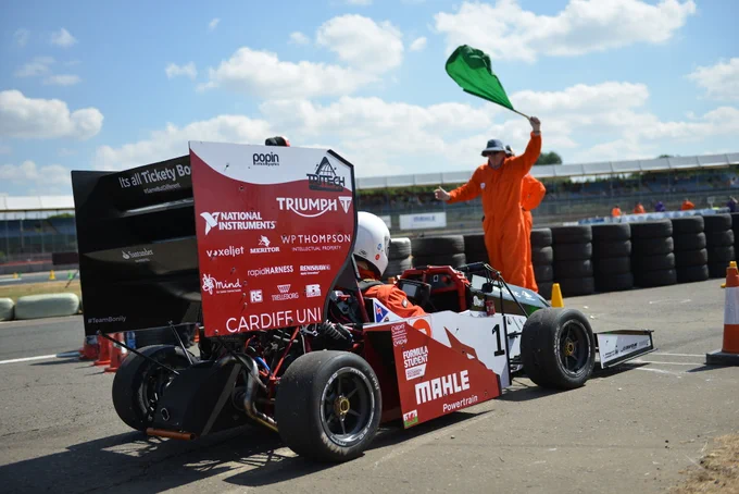 Cardiff Racing prepare to start the Sprint event at FS2019 at Silverstone, with a Marshall raising a green starter flag