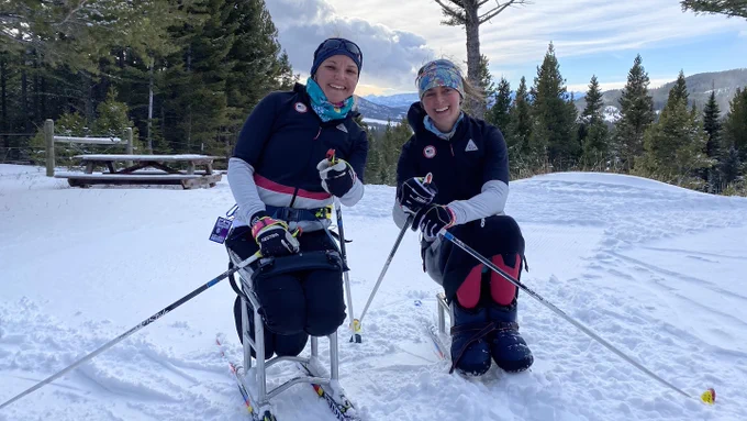 Erin Martin and Heather Galeotalanza pose after a race