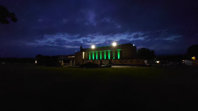 Walthamstow Assembly Hall illuminated in green  
