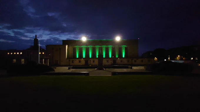 Walthamstow Assembly Hall illuminated in green  