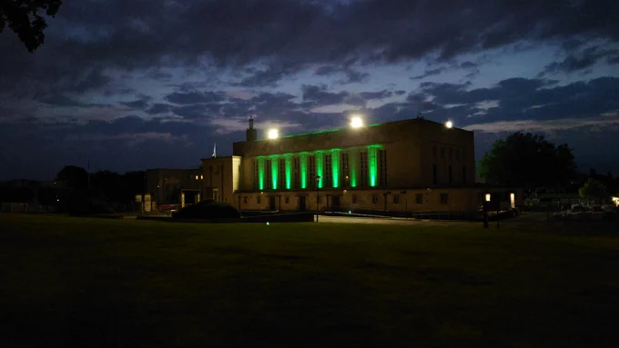 Walthamstow Assembly Hall illuminated in green  