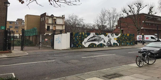 An example of Camden Walking Ethnography - a street with a wall mural of a fish.
