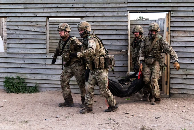 Royal Marines evacuate a casualty during training missions