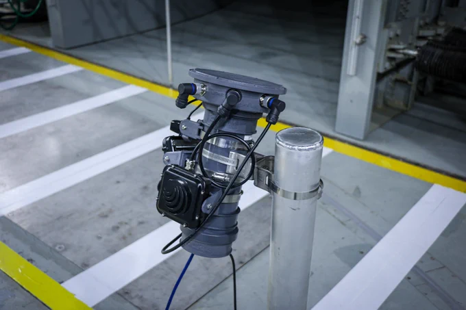 A sensor used for autonomous testing placed on a pole for display