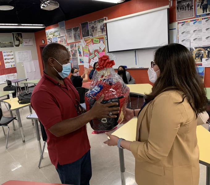 Mr. Broils receiving his basket.