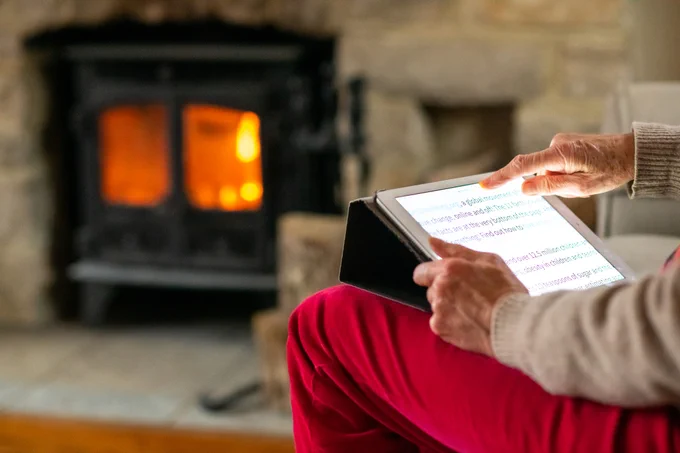 Someone using an iPad.