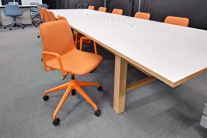 Office work chair with arms, height adjustability and 5-castor base.