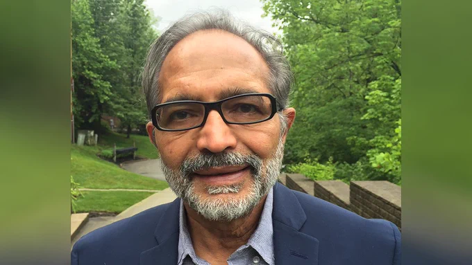Headshot of Vijay Vasudevan outside.