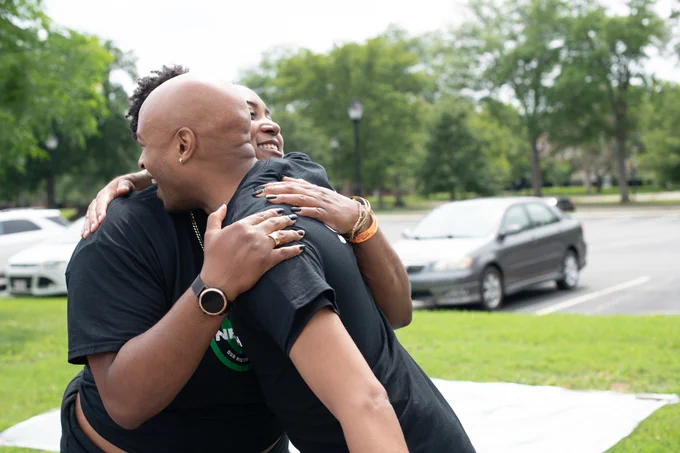 Two people hugging at Juneteenth