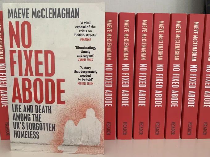 A row of paperback books - all read "No Fixed Abode"
