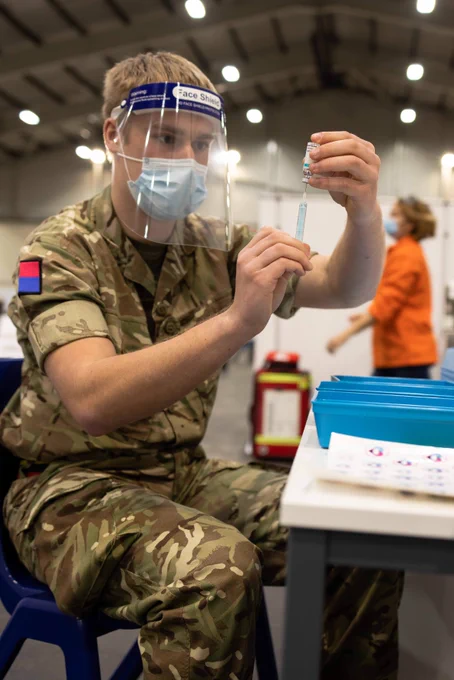 Lbdr Luke Thompson preparing a vaccine