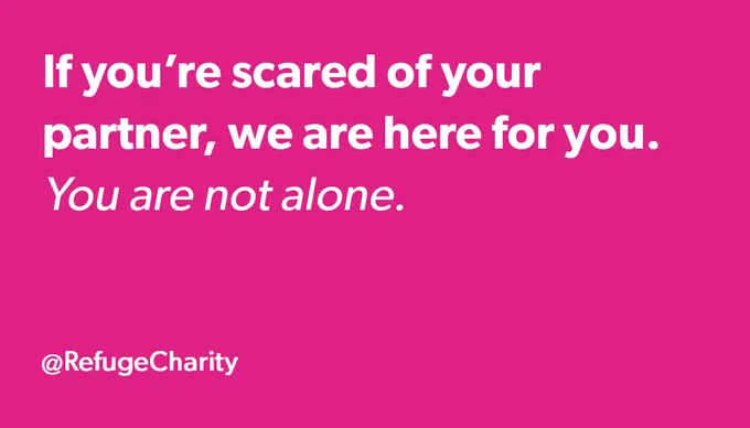 White text on pink background. If you're scared of your partner, we are here for you. You are not alone.