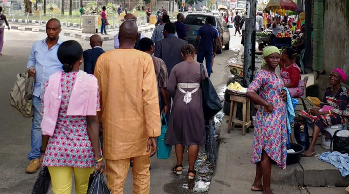 Pedestrians on busy street