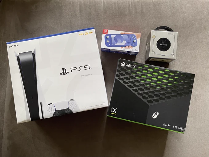 pictured: playstation 5, nintendo switch lite, game cube, xbox series x 