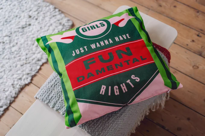 Girls just wanna have fundamental rights cushion. Designed by Here. Design, photographed by Ruth Ward.