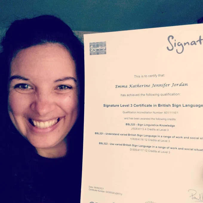 a picture of Jennifer Jordan looking happy as can be, as she has passed her British Sign Language Level 3