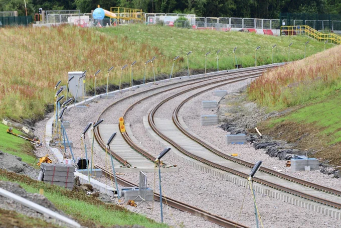 A photo of the second track being installed on a curve parallel to the first one at Werrington.