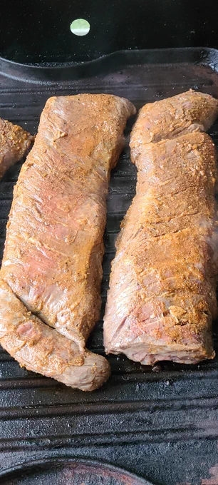 Seasoned, carne asada on the grill