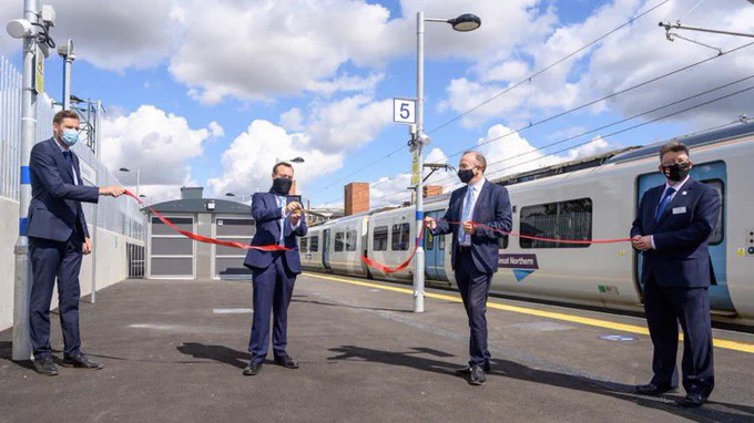 A ceremonial ribbon is cut on the brand new platform at Stevenage a year ago today.