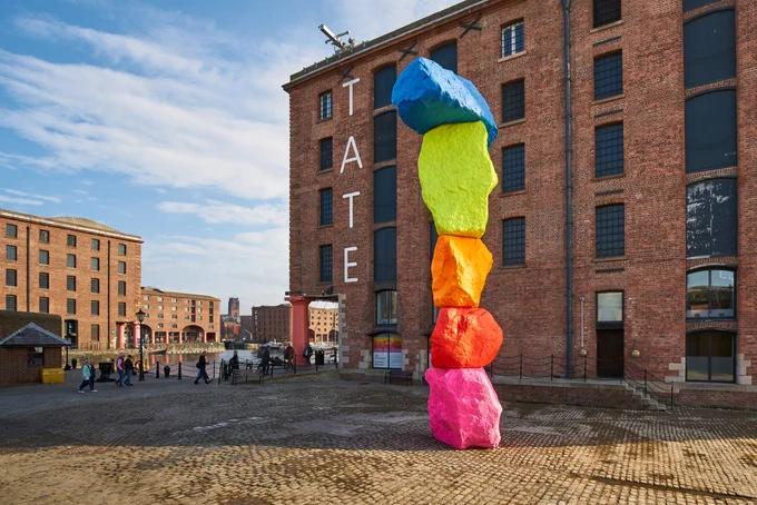 A rainbow coloured sculpture outside Tate Liverpool