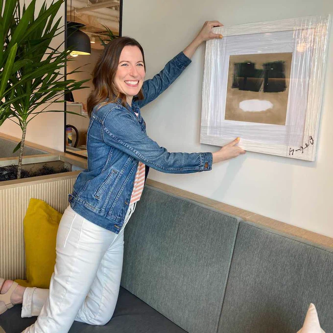 Riggs puts the finishing touches on the design at Industrious Pike & Rose in North Bethesda, Maryland.