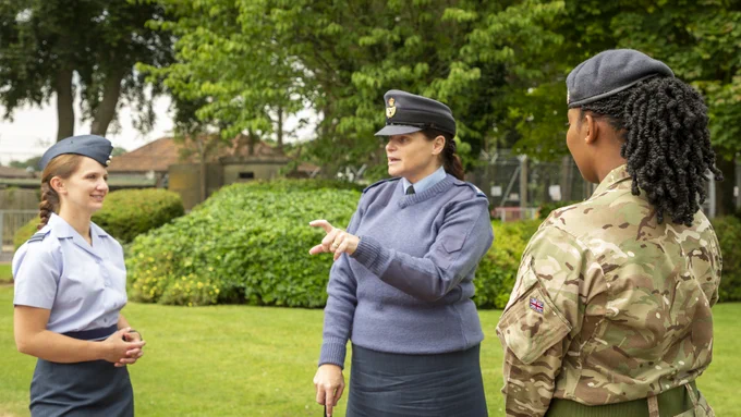 Three RAF females in discussion